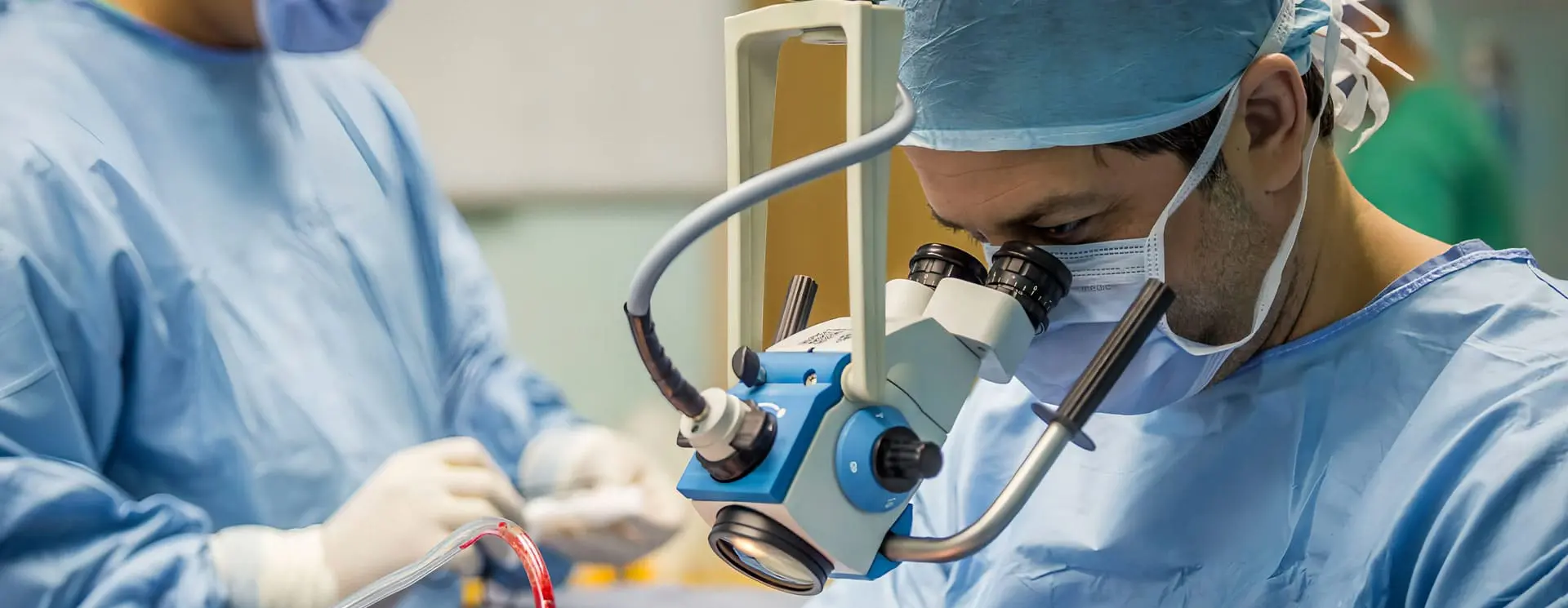 ENT Doctor Dubai Prof. Dr. Tamer Fawzy performing ENT surgery using advanced medical technology